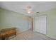 Spare bedroom featuring a closet and overhead lighting at 2551 W Burr Oak Ct, Sarasota, FL 34232