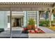 Inviting condo entrance with well-kept landscaping and covered walkway at 3300 S Beneva Rd # 224, Sarasota, FL 34232