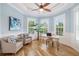 Bright office space featuring lots of natural light from the bay window and neutral decor at 1810 Lincoln Dr, Sarasota, FL 34236