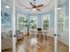 Inviting office space with bay windows, plantation shutters, and hardwood flooring at 1810 Lincoln Dr, Sarasota, FL 34236