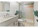 Clean bathroom showcasing updated fixtures, a walk-in shower, and contemporary design at 5697 Sheffield Greene Cir # 51, Sarasota, FL 34235