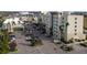 Modern building with lush landscaping and convenient parking in a vibrant commercial area with restaurants at 5697 Sheffield Greene Cir # 51, Sarasota, FL 34235