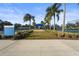 The community park has well-maintained tennis courts surrounded by palm trees and greenery at 11422 Griffith Park Ter, Bradenton, FL 34211