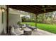 Patio with plush outdoor furniture and a view of the backyard at 3348 S Seclusion Dr, Sarasota, FL 34239