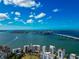 Breathtaking aerial shot showcasing the coastal community with bridge and stunning waterfront views at 378 Golden Gate Pt # 6, Sarasota, FL 34236