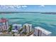 Luxury waterfront condos with bay views and beautifully landscaped surroundings, providing an exquisite coastal living experience at 378 Golden Gate Pt # 6, Sarasota, FL 34236