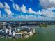 Beautiful aerial view of waterfront condos and a marina, highlighting the coastal lifestyle at 378 Golden Gate Pt # 6, Sarasota, FL 34236