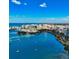 Breathtaking aerial view of Sarasota Bay showcasing the waterfront homes and marina at 378 Golden Gate Pt # 6, Sarasota, FL 34236