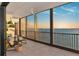 Relaxing balcony with comfortable chairs offering breathtaking ocean views and a serene atmosphere at 378 Golden Gate Pt # 6, Sarasota, FL 34236