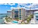 Luxury waterfront condo featuring a private pool, waterfront views, and outdoor lounge area, perfect for relaxation and entertaining at 378 Golden Gate Pt # 6, Sarasota, FL 34236