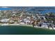 Stunning aerial view of a coastal home near the serene waterfront at 3939 Higel Ave, Sarasota, FL 34242