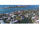 An aerial view of the waterfront community with deep water canals with access to the ocean at 3939 Higel Ave, Sarasota, FL 34242