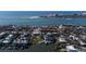 An aerial view of the coastal community near the ocean, with homes featuring canal access at 3939 Higel Ave, Sarasota, FL 34242