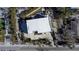 Aerial view of property, with landscaped yard, and paved driveway at 3939 Higel Ave, Sarasota, FL 34242