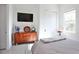 Clean bedroom featuring an accent table with a drum set and closet at 3939 Higel Ave, Sarasota, FL 34242