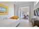 Bright bedroom featuring a walkout to the patio and a decorative yellow mirror at 3939 Higel Ave, Sarasota, FL 34242