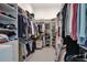 Large walk-in closet with ample shelving and hanging space, offering plenty of storage at 3939 Higel Ave, Sarasota, FL 34242