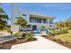 Modern two-story home with a manicured lawn and inviting outdoor space at 3939 Higel Ave, Sarasota, FL 34242