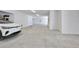 Clean garage interior with multiple parking spaces and storage at 3939 Higel Ave, Sarasota, FL 34242