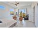 Bright main bedroom with comfortable seating area and access to a private balcony at 3939 Higel Ave, Sarasota, FL 34242