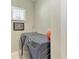 Modern laundry room with front-load washer and dryer, complemented by natural light from the window at 4514 Big Woods Way, Parrish, FL 34219