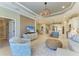 Open concept living room flowing to kitchen at 4514 Big Woods Way, Parrish, FL 34219