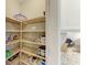 Open pantry with shelving at 4514 Big Woods Way, Parrish, FL 34219