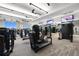 Well equipped workout room featuring various workout machines, televisions, and mirrors at 4534 Trento Pl, Bradenton, FL 34211