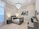 Cozy bedroom featuring a unique chandelier, neutral tones, and ample natural light at 5305 Brookgrove Dr, Sarasota, FL 34238