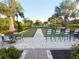 Landscaped bocce ball court with seating at 5305 Brookgrove Dr, Sarasota, FL 34238