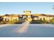 Exterior of the clubhouse building showing the well-maintained landscaping at 5305 Brookgrove Dr, Sarasota, FL 34238