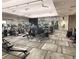 Well-equipped gym featuring treadmills, weight machines, and other fitness equipment for residents at 5305 Brookgrove Dr, Sarasota, FL 34238