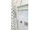 Luxurious shower featuring marble walls, a built-in niche, and stylish fixtures at 5305 Brookgrove Dr, Sarasota, FL 34238
