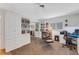 Bedroom with built-in bookcases, and dedicated work space at 5376 Shadow Lawn Dr, Sarasota, FL 34242