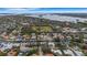 Stunning aerial view of the property showcasing its proximity to the water and beautiful neighborhood at 5402 Shadow Lawn Dr, Sarasota, FL 34242