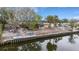 Backyard view with gazebo, dock, canal access, and outdoor seating at 5402 Shadow Lawn Dr, Sarasota, FL 34242
