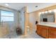 Updated bathroom with glass enclosed shower, modern vanity and fixtures, and neutral color scheme at 5402 Shadow Lawn Dr, Sarasota, FL 34242