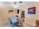 Charming dining area with a view to the kitchen and ample space for Gathering meals at 5402 Shadow Lawn Dr, Sarasota, FL 34242