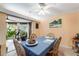 Bright dining area with a view to outdoor, creating a seamless indoor-outdoor experience at 5402 Shadow Lawn Dr, Sarasota, FL 34242