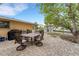 Outdoor patio with grill, furniture, and views of gazebo and canal at 5402 Shadow Lawn Dr, Sarasota, FL 34242