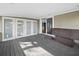 Covered patio offers views of the kitchen and the outdoor landscape at 5645 Churchill Downs Rd, Sarasota, FL 34241