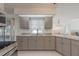 Modern kitchen features granite countertops and stainless steel appliances at 625 Ennis Nw Ter, Port Charlotte, FL 33952