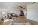 Open living room with hardwood floors, ceiling fans, and modern decor at 625 Ennis Nw Ter, Port Charlotte, FL 33952