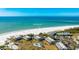 Beautiful aerial view of beachfront condos with beach access and sparkling turquoise waters at 7155 Gulf Of Mexico Dr # 22, Longboat Key, FL 34228