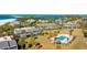 Well-maintained condo complex with a sparkling pool and lush tropical landscaping at 7155 Gulf Of Mexico Dr # 22, Longboat Key, FL 34228