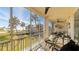 Relaxing screened porch with comfortable seating and stunning views of the Gulf at 7155 Gulf Of Mexico Dr # 22, Longboat Key, FL 34228