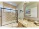 Bright bathroom featuring a shower-tub, vanity with granite counter, and ample counter space at 22623 Morning Glory Cir, Bradenton, FL 34202