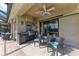 Outdoor kitchen featuring a built-in grill, sink, and dining space for entertaining at 22623 Morning Glory Cir, Bradenton, FL 34202