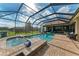 Beautiful backyard pool and spa area provide a luxurious and private outdoor experience at 22623 Morning Glory Cir, Bradenton, FL 34202