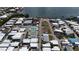 Aerial view of the community with a pool and tennis courts at 2601 Gulf N Dr # B16, Bradenton Beach, FL 34217